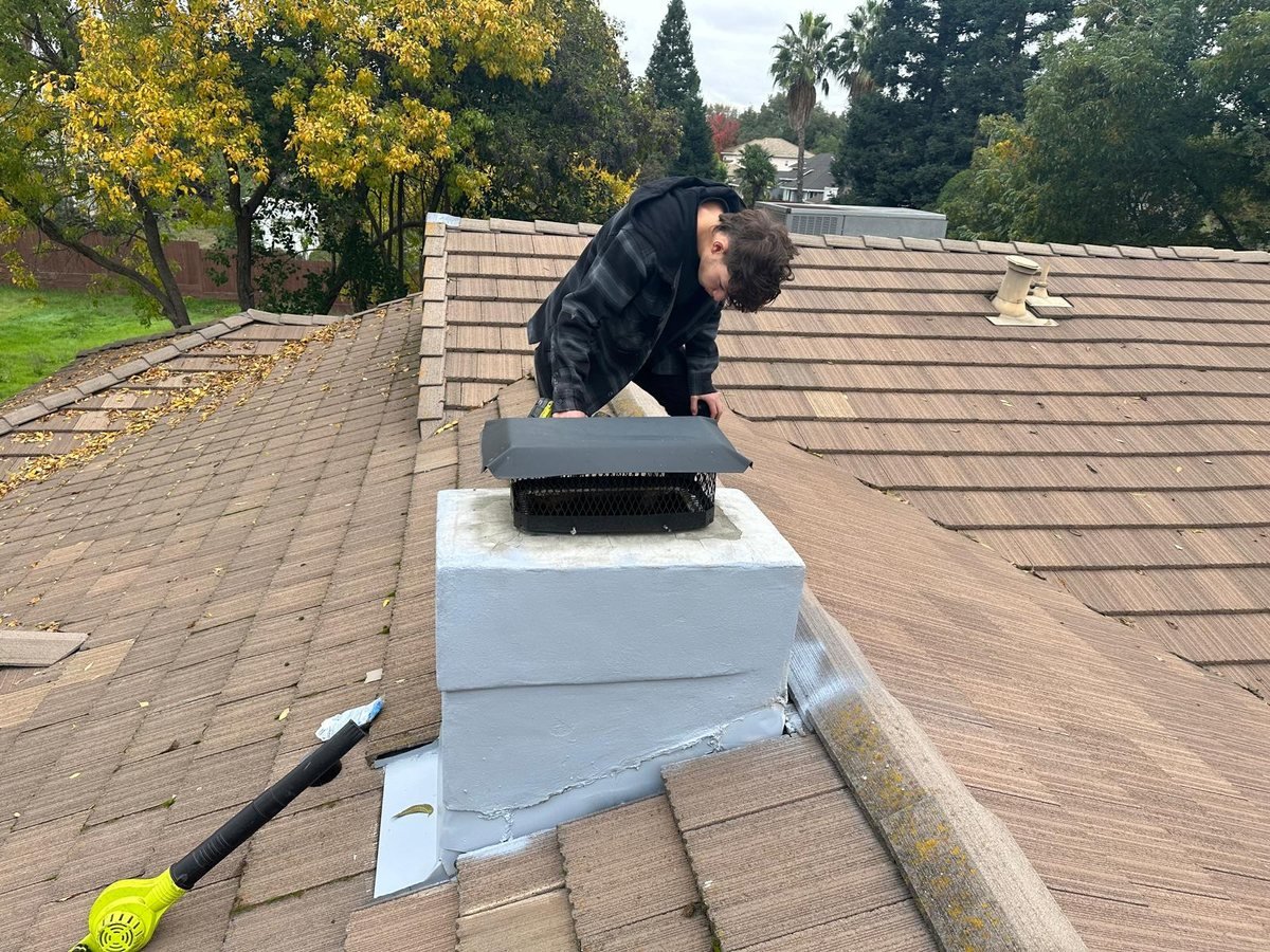 Freshly resurfaced chimney crown with a drip edge